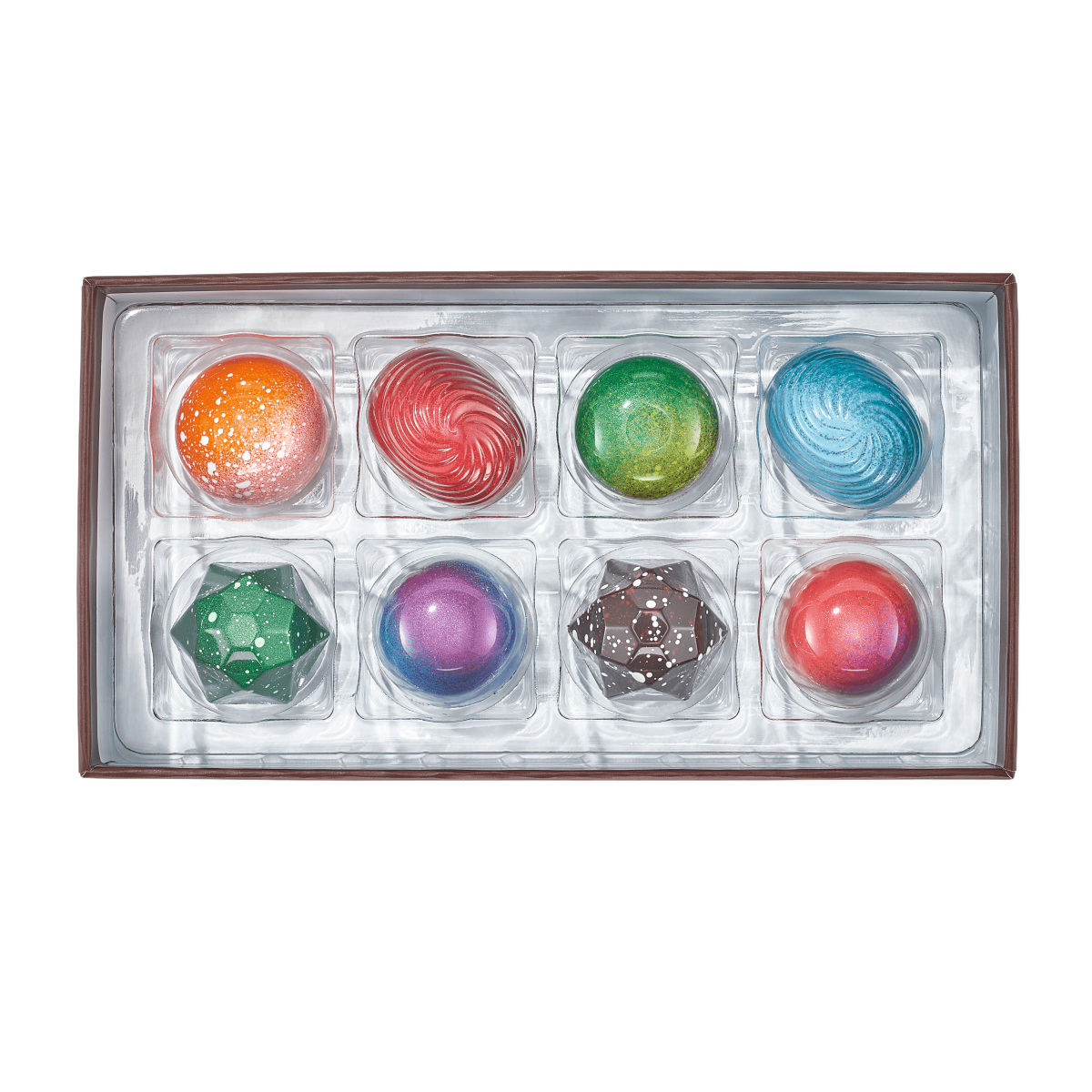 Eight colorful Christopher Elbow artisan chocolates
